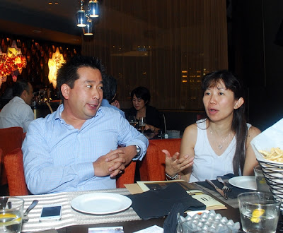 Mr. Soemantri listening carefully to fellow blogger, Evelyn's enquiries