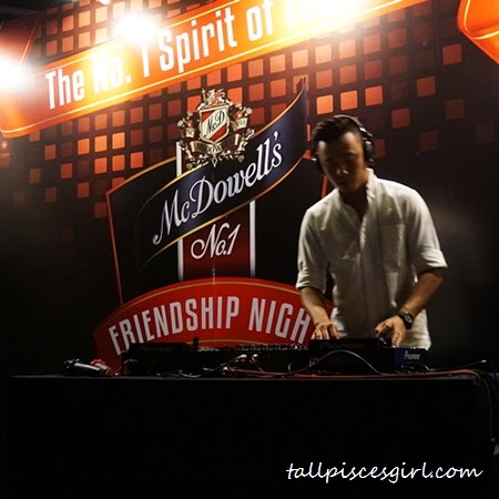 Have a sip of whisky while watching Victor Chan DJ-ing