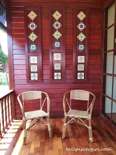 Window pane from old kampung house turned into decoration piece | Experience Kampung Life at Rimba Alor Orchard Villas Melaka Window pane from old kampung house turned into decoration piece