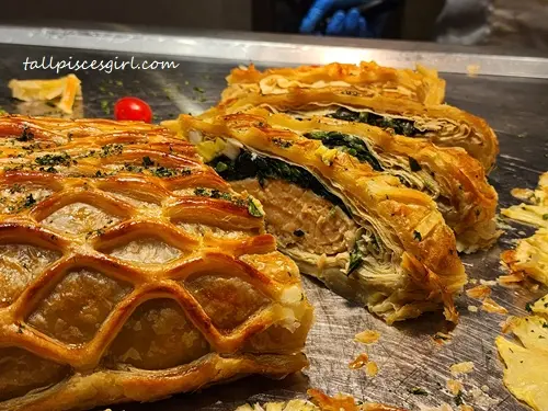 Salmon Coulibiac with Creamed Spinach | Hilton Petaling Jaya Christmas Buffet 2023 and Hilton Holidays Offerings Salmon Coulibiac with Creamed Spinach